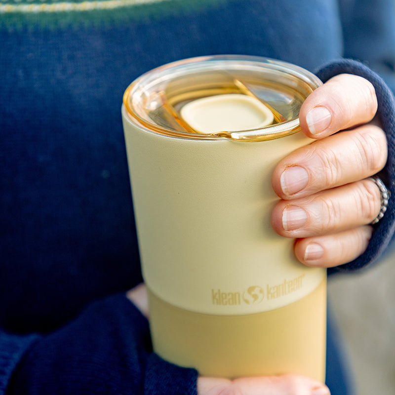 daily-on-the-go-set-l4 16oz_rise_tumbler_wax_yellow_closeup_hand_lid_square.jpg