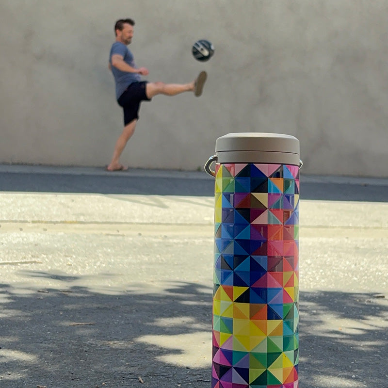 20oz-tkwide-with-twist-cap-mosaic-j1 20oz_tkwide_bottle_seasonal_mosaic_soccerball_player_square.jpg