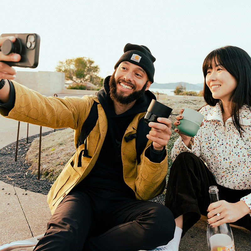 bring-your-own-party-kit-tumblers-and-cocktails-c0 8oz_rise_lowball_black_iceberg_couple_selfie_city_square.jpg