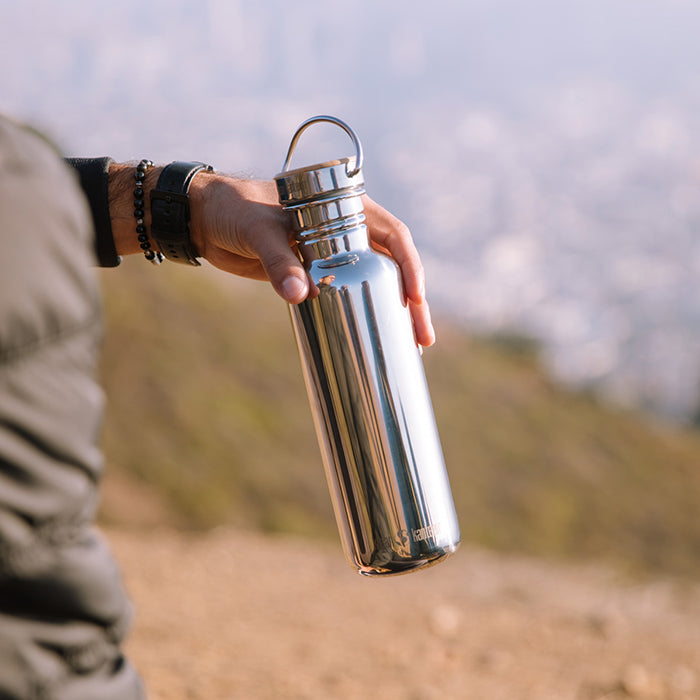 27oz-reflect-with-bamboo-cap-x1 K27SSLRF-MS-BAMBOO_reflect_bottle_hand_lifestyle.jpg